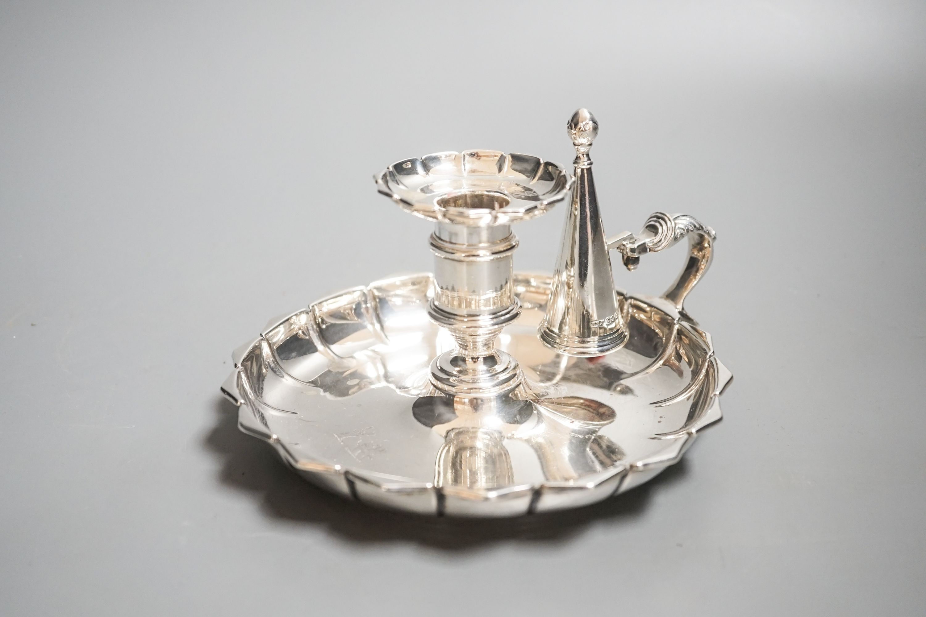 A William IV silver chamberstick, by Robinson, Edkins & Aston, Birmingham, 1835, 16.2cm, in diameter, 11oz.